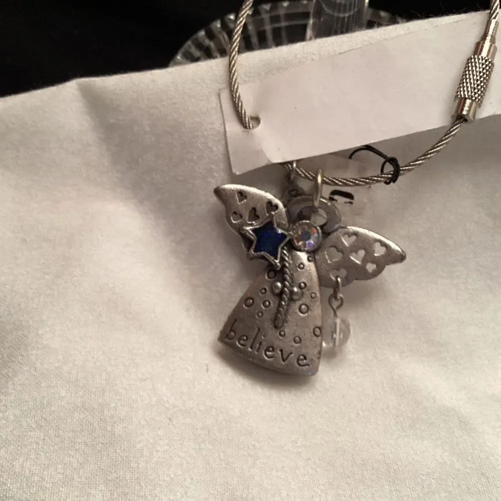 Chico’s Silvertone Believe Angel Wire Bracelet
